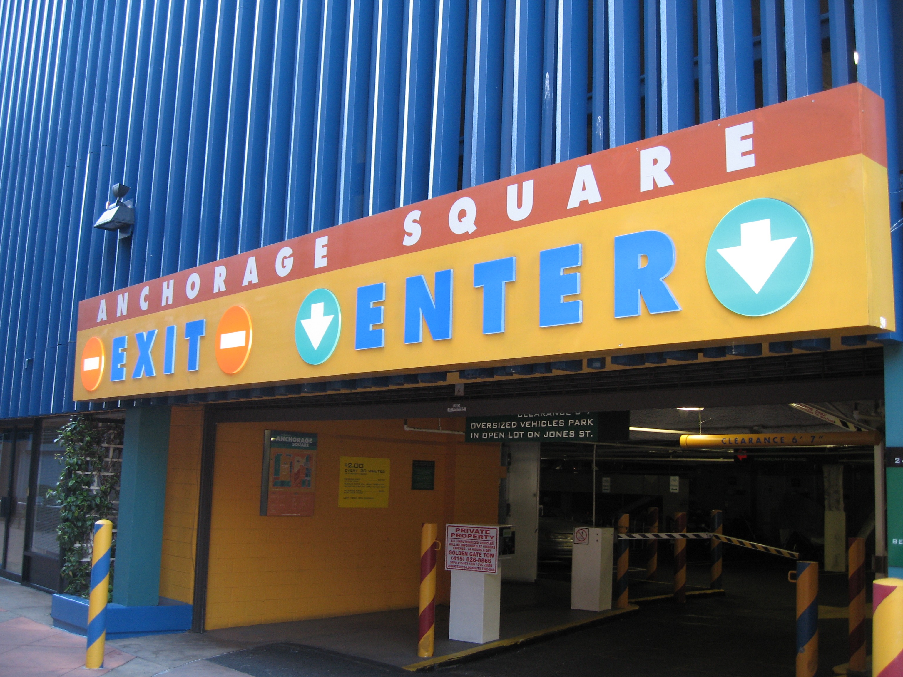 Anchorage Square EXIT and ENTER canopy sign in daylight