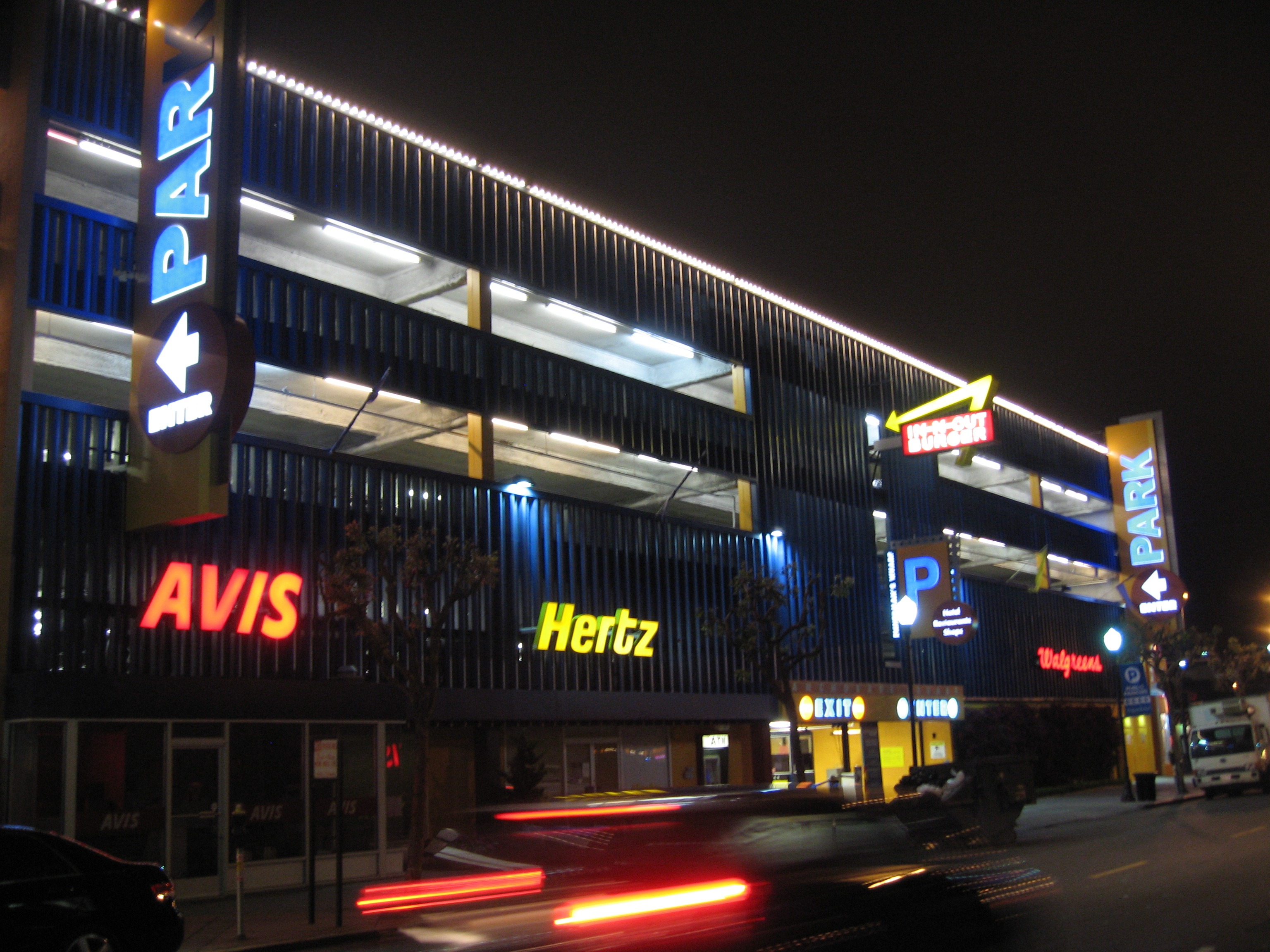 Anchorage Square parking structure signage illuminated at night