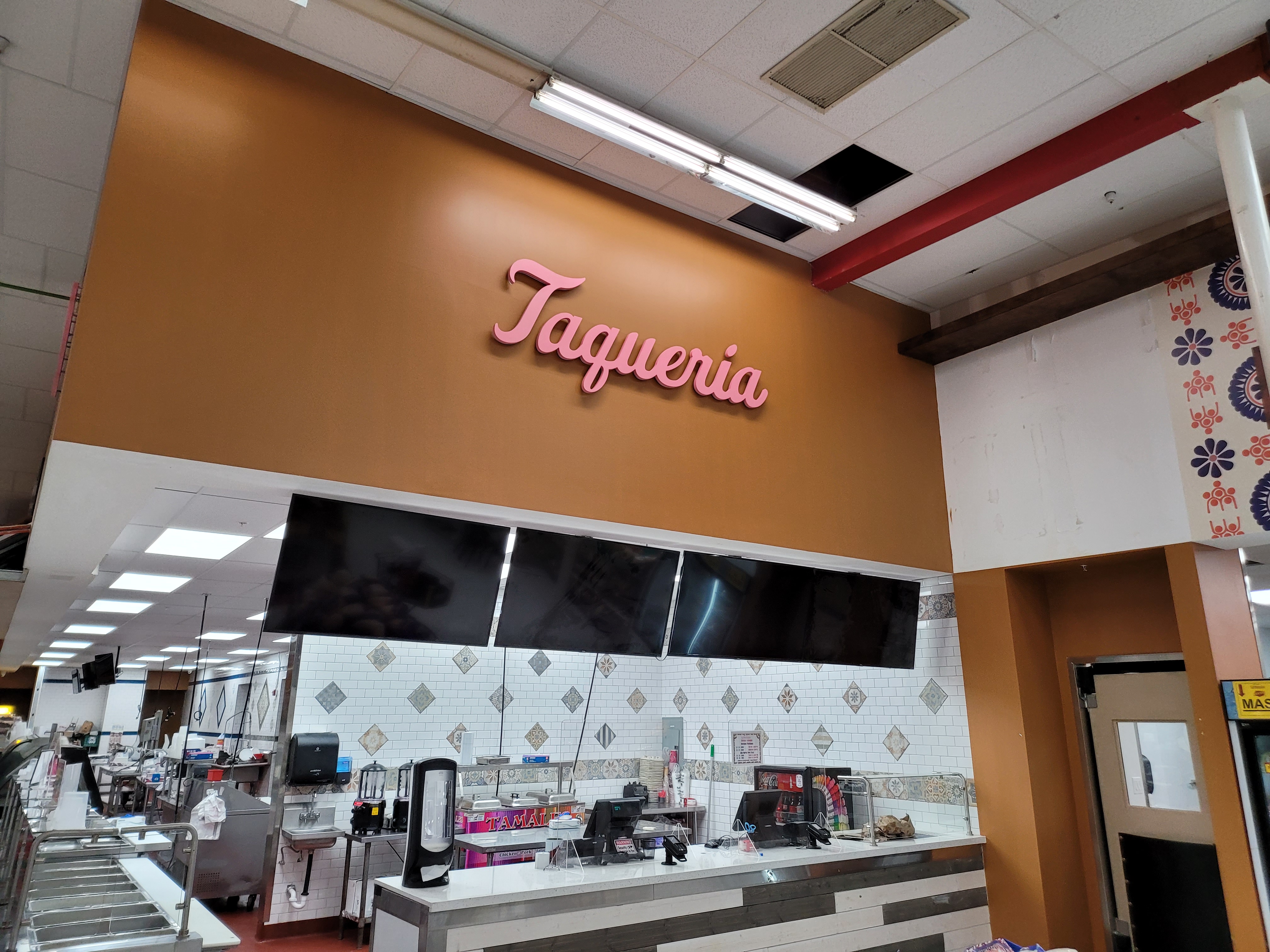 Taquería dimensional script letters