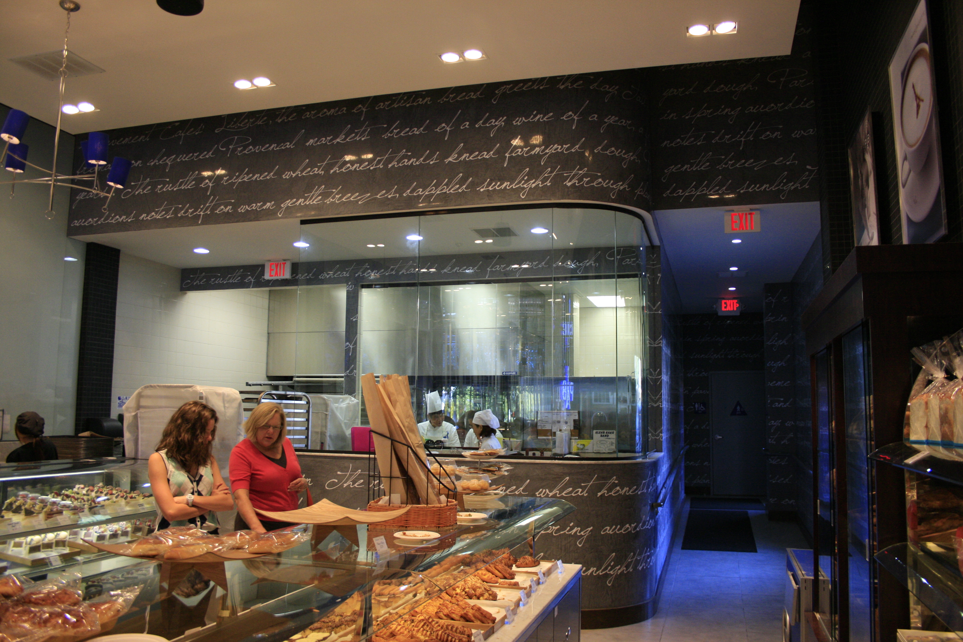 Bakery counter beneath wrapping wall typography